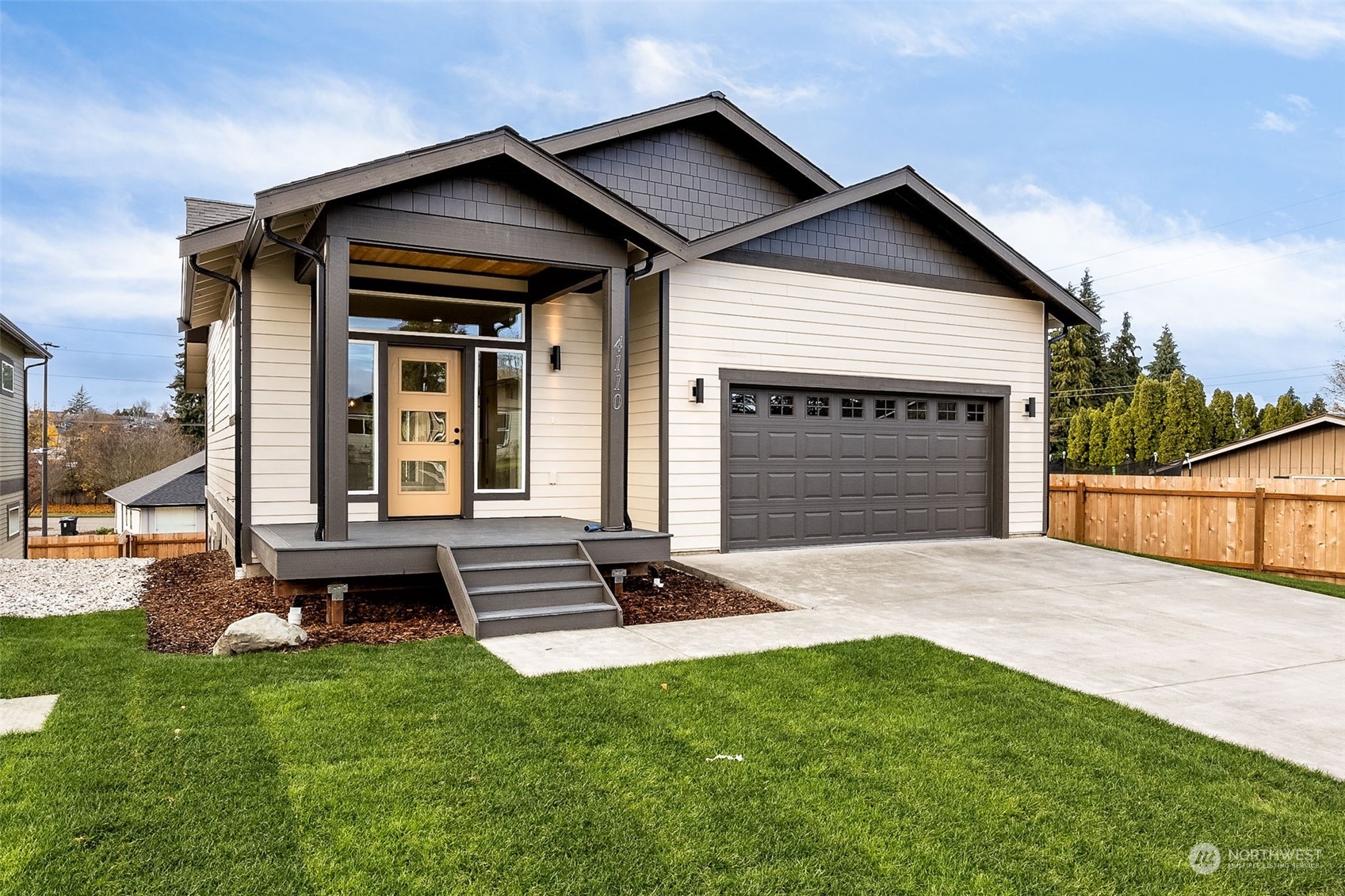 a front view of a house with a yard