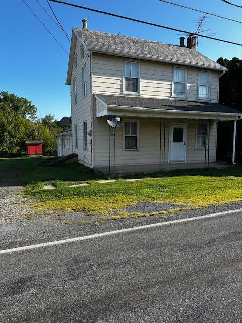 a view of a house with a swimming pool