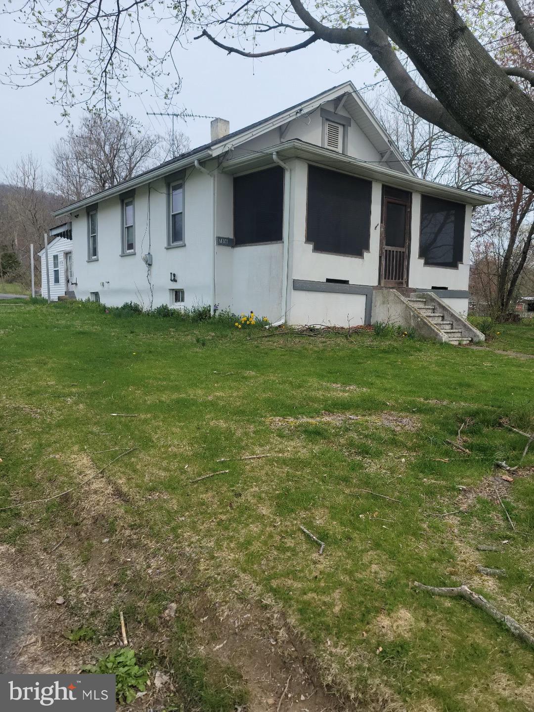 a front view of house with yard