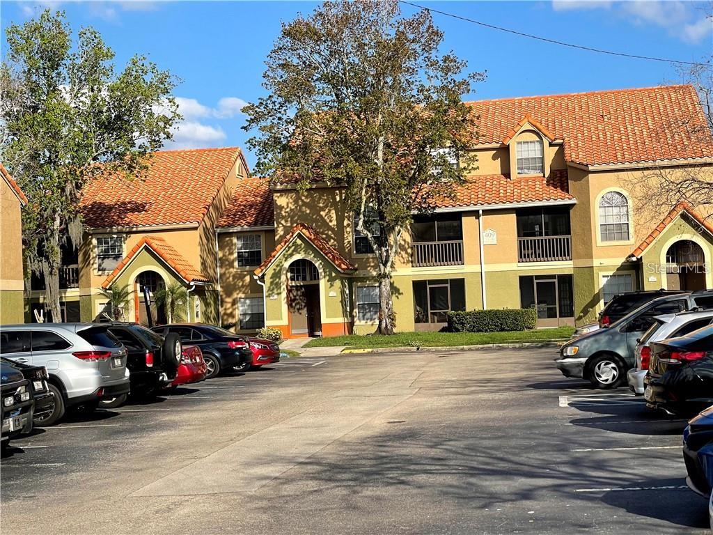 a building with cars parked in front of it