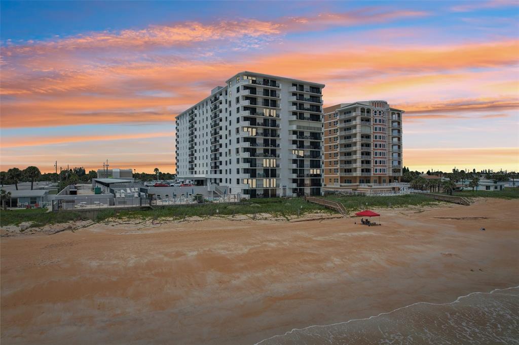 a view of a city with tall buildings