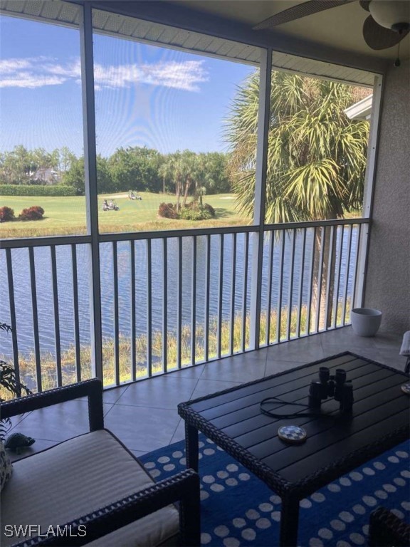 a view of a chairs and a table in the balcony