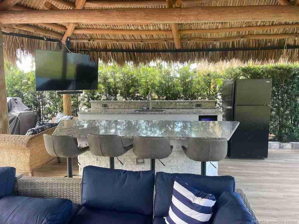 a view of balcony and deck with patio