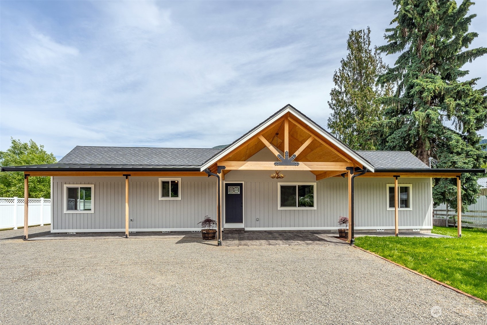 front view of a house with yard