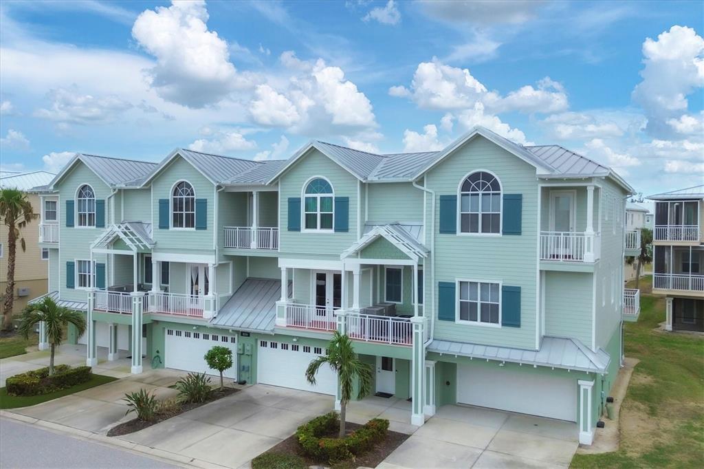 a front view of a residential houses with yard