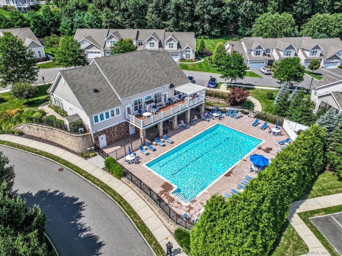 an aerial view of a house with a garden