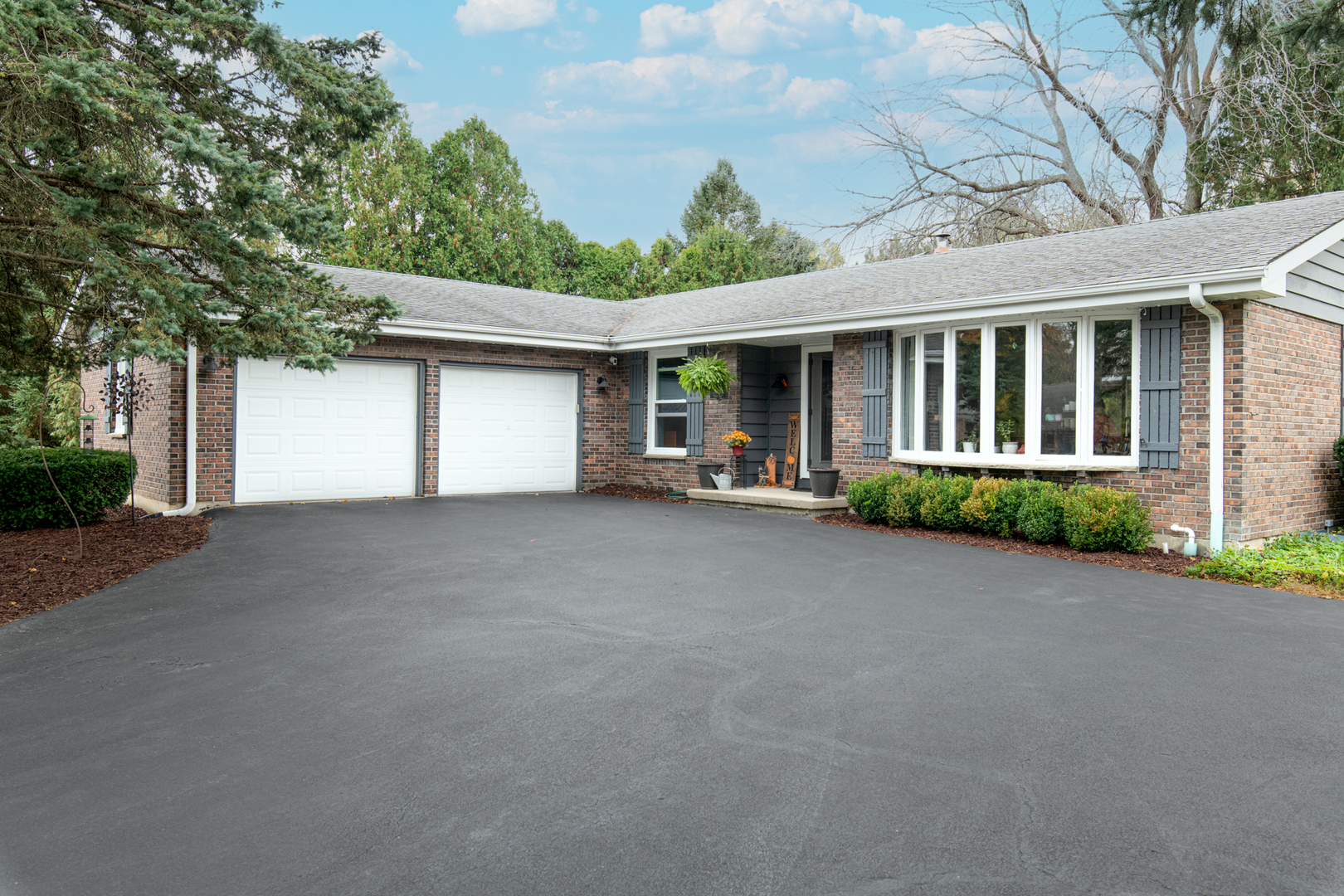 front view of a house with a patio