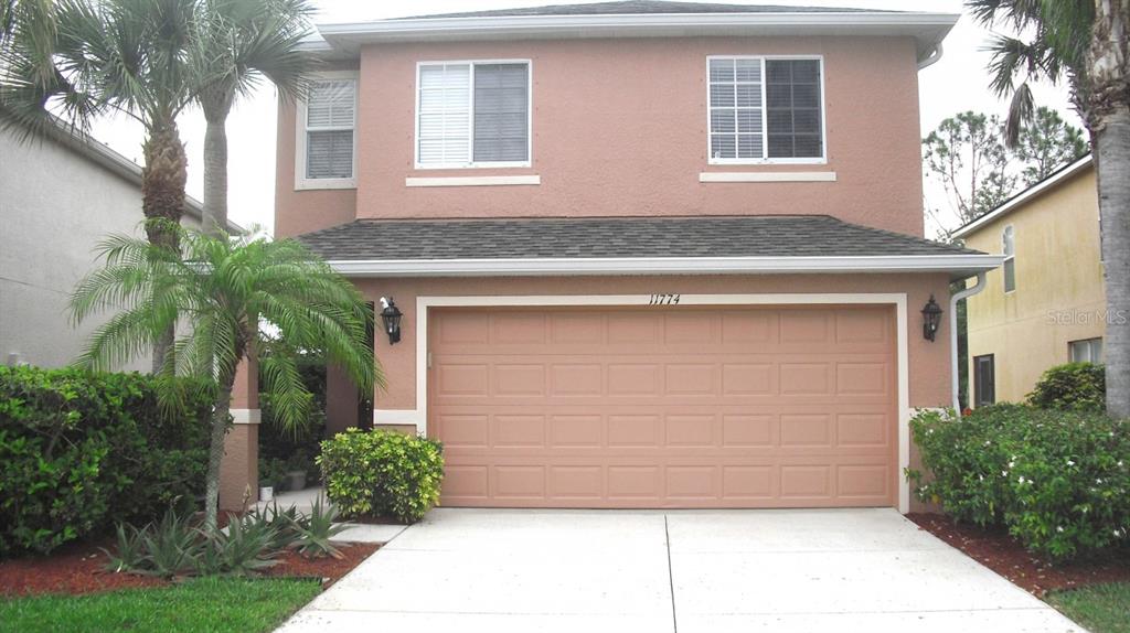 a front view of a house having yard