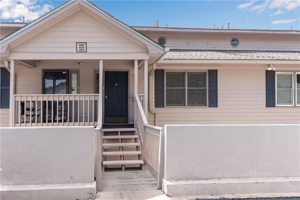 a view of a house with deck