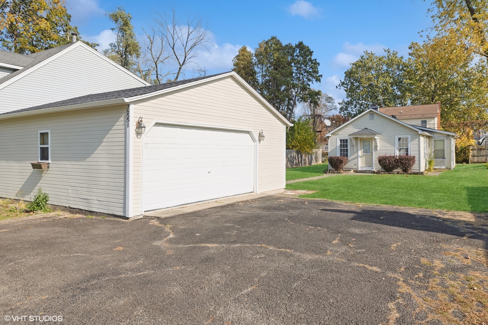 a view of outdoor space yard and garage