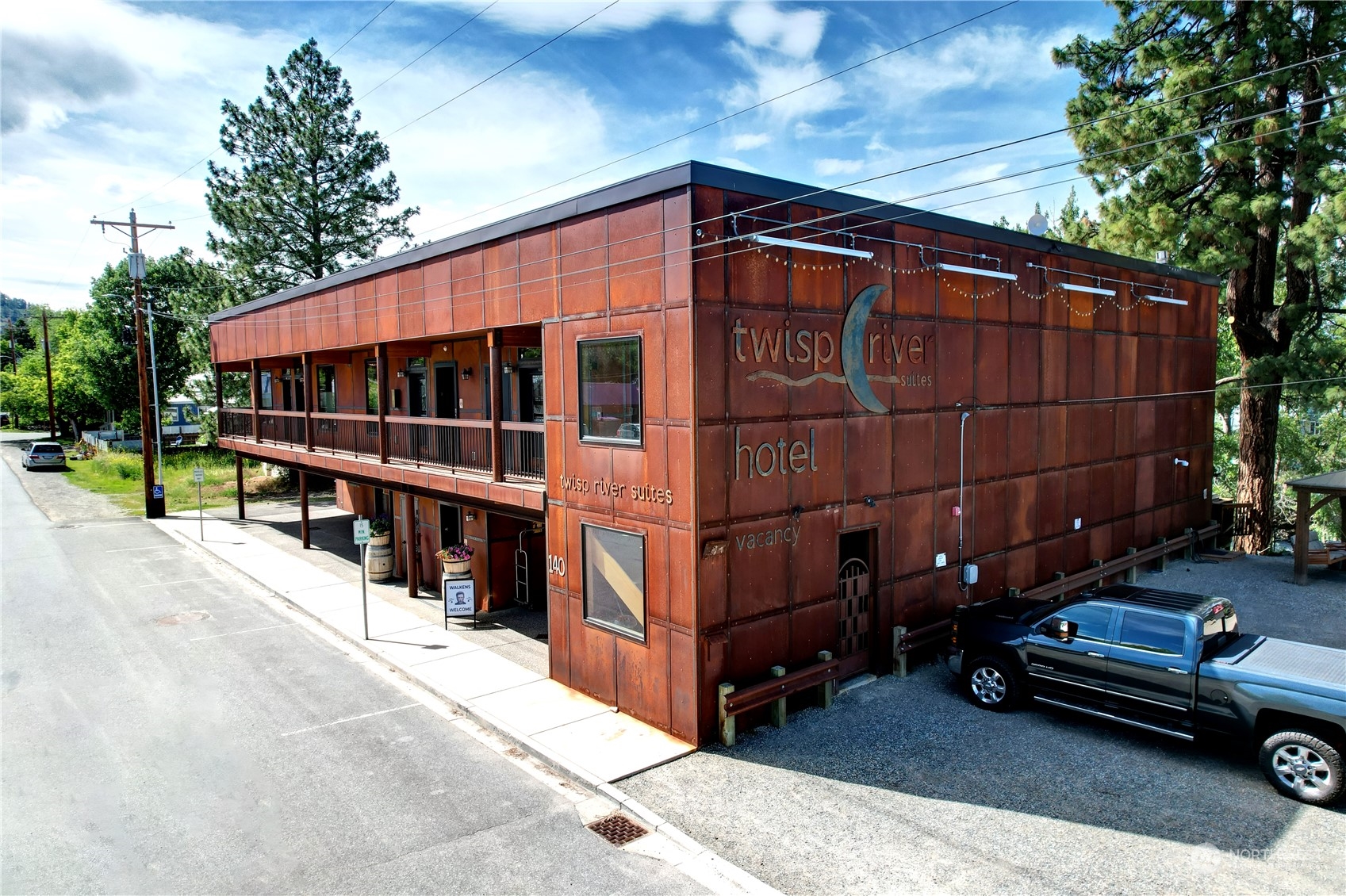 a view of a car park in front of house