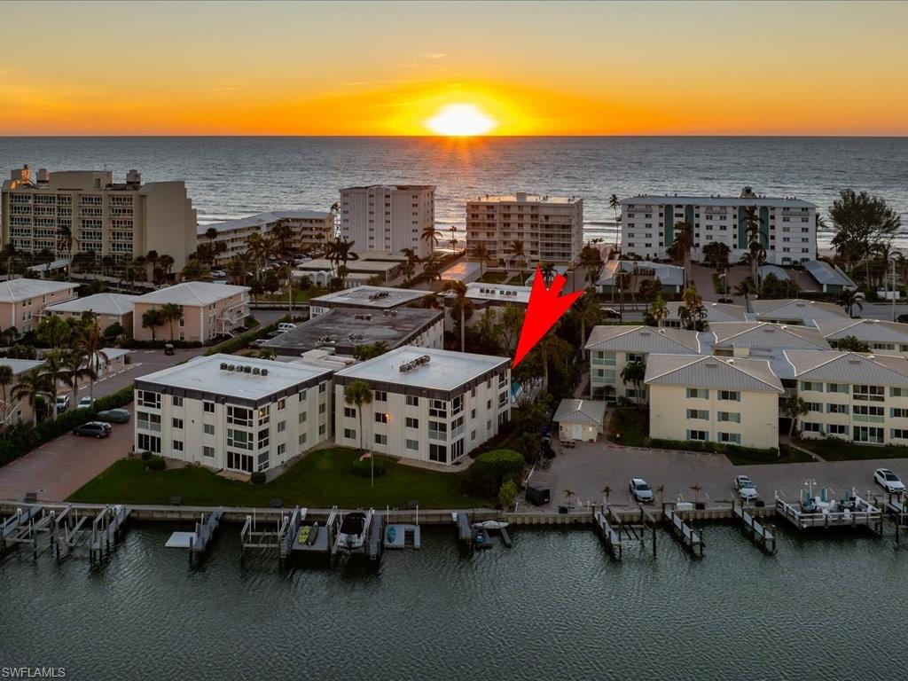 Aerial view at dusk with a water view