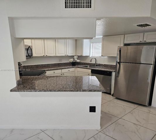 $275,000 | 8235 Lake Drive, Unit 108 | Doral