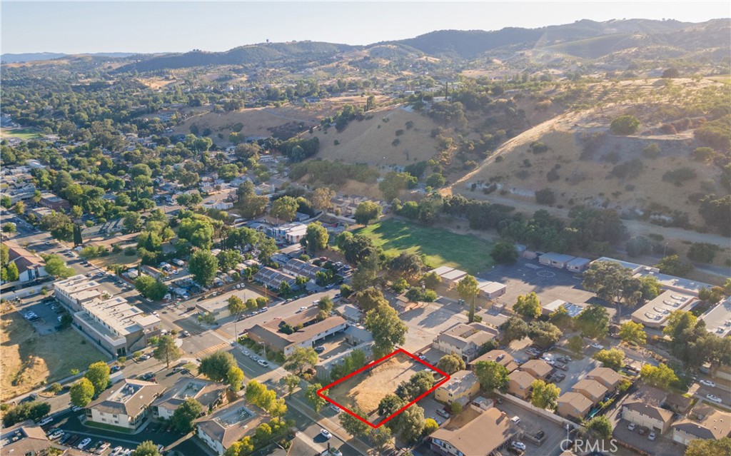 an aerial view of residential house with outdoor space