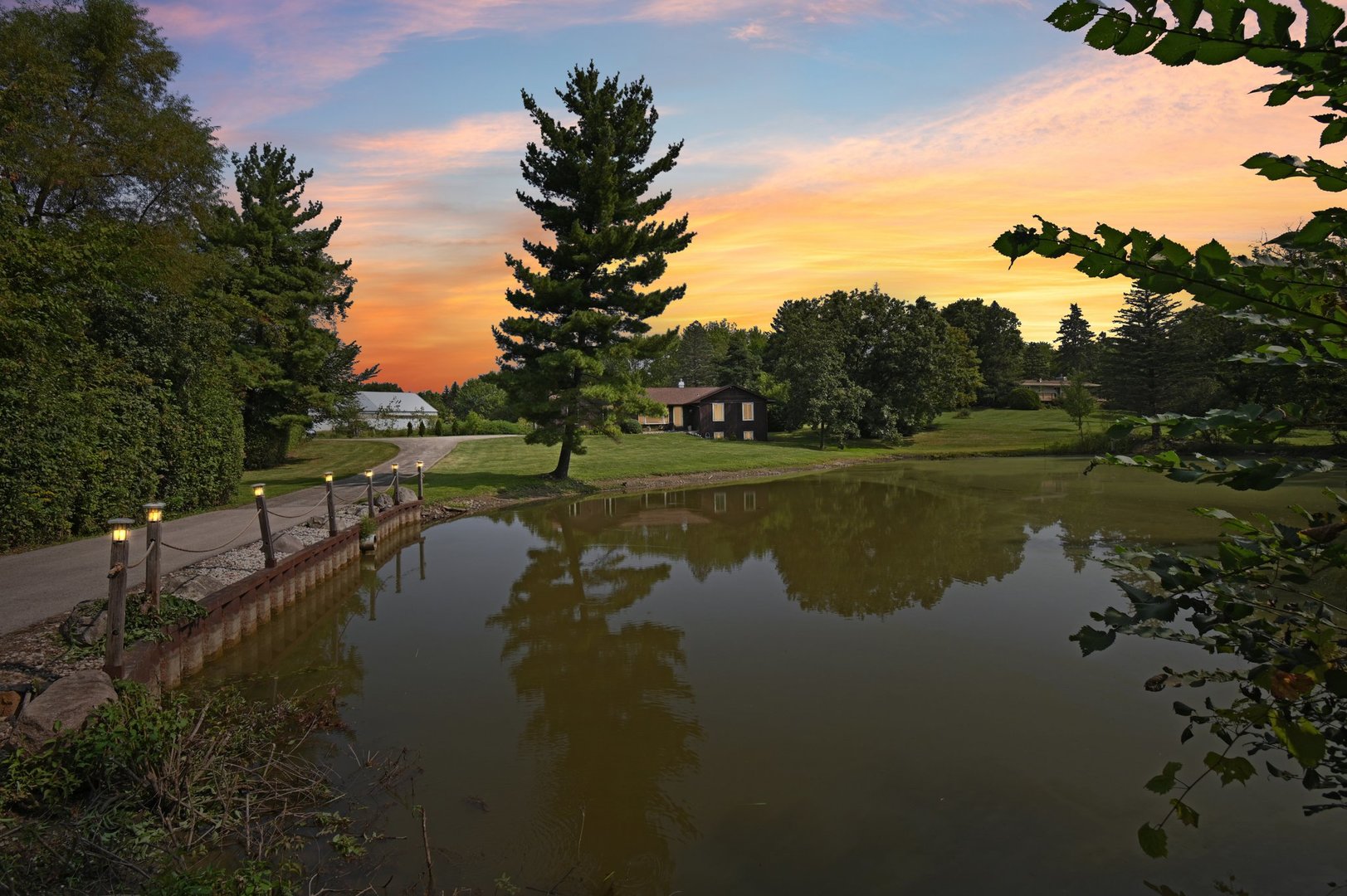 a view of a lake with a big yard