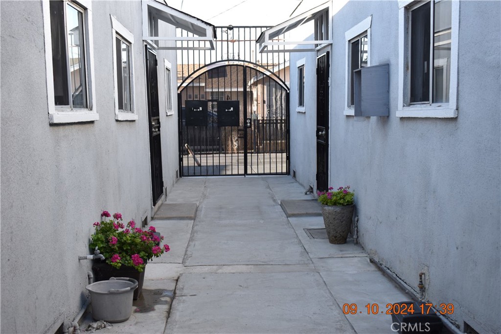 a view of entryway with flower pots