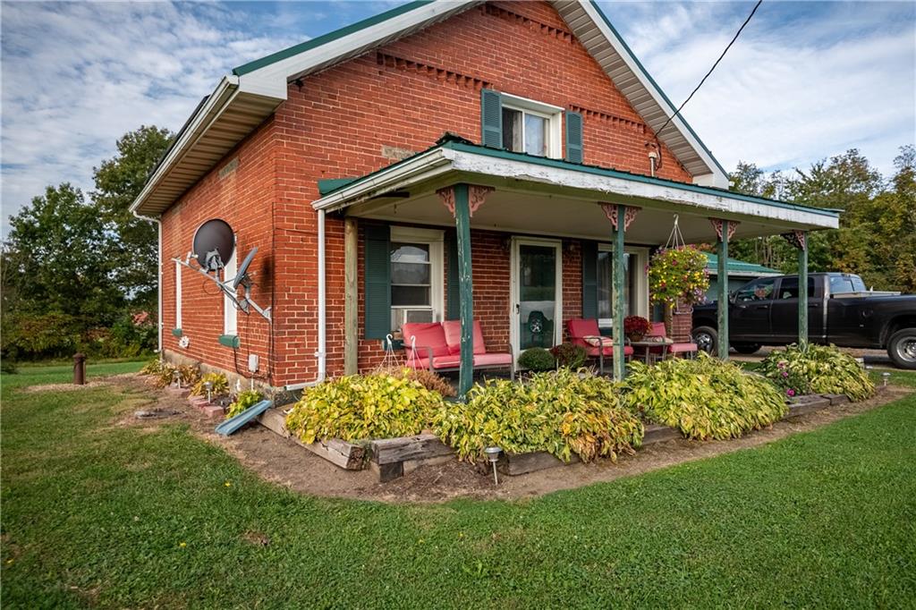 front view of a house with a yard