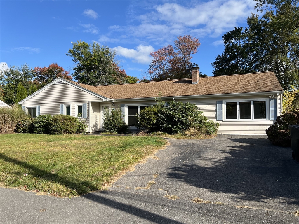 front view of a house and a yard