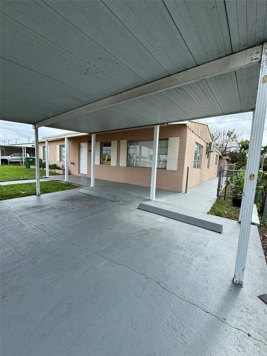 a view of house with outdoor space and porch