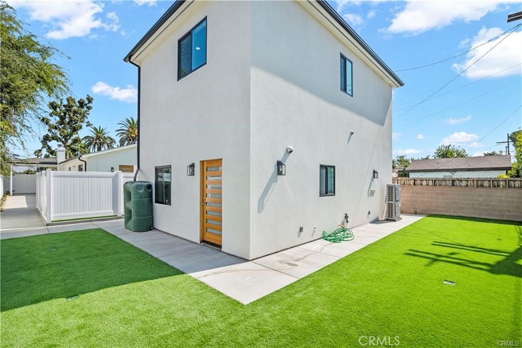 a view of a backyard with a garden