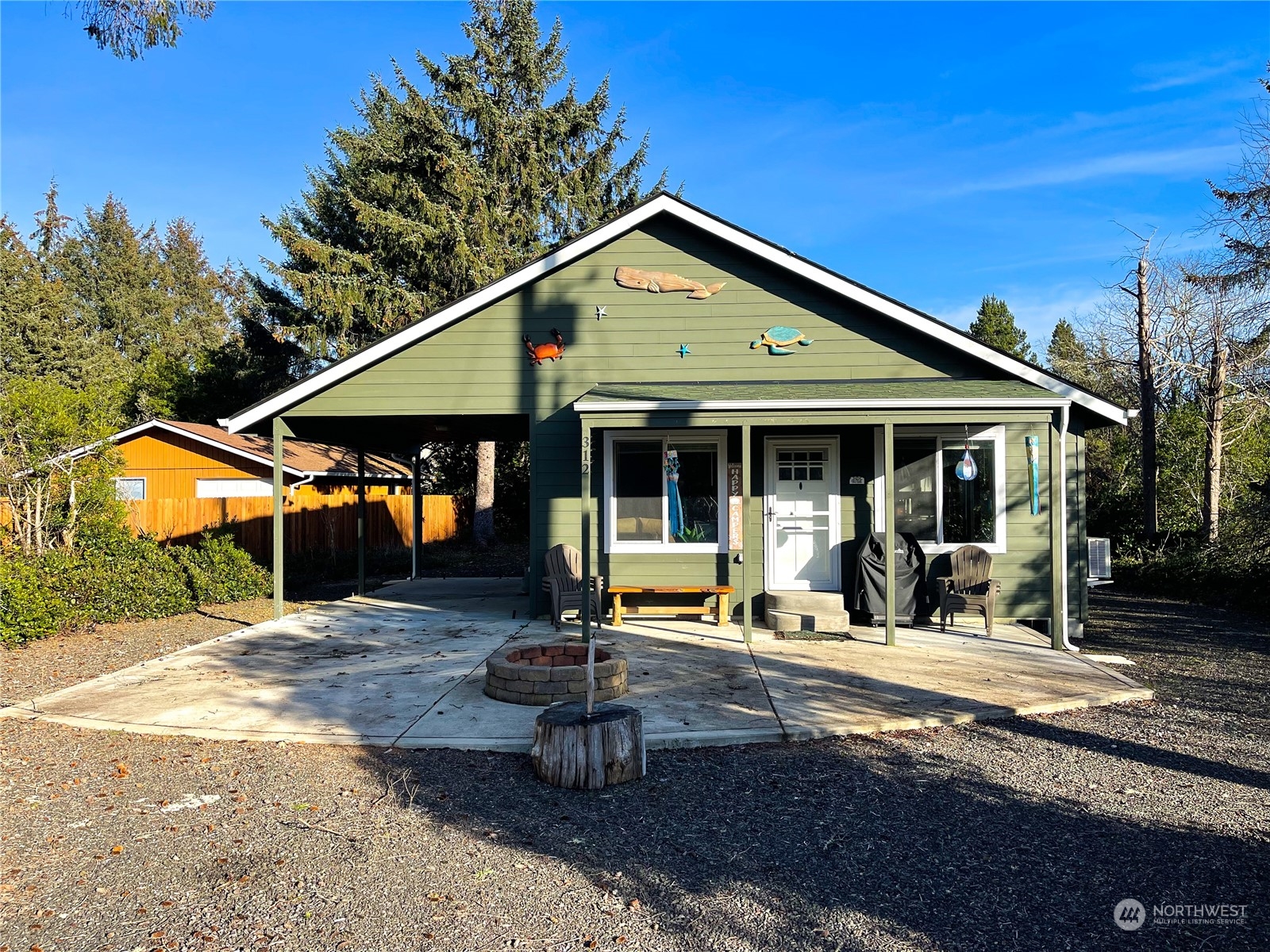 a front view of a house with patio