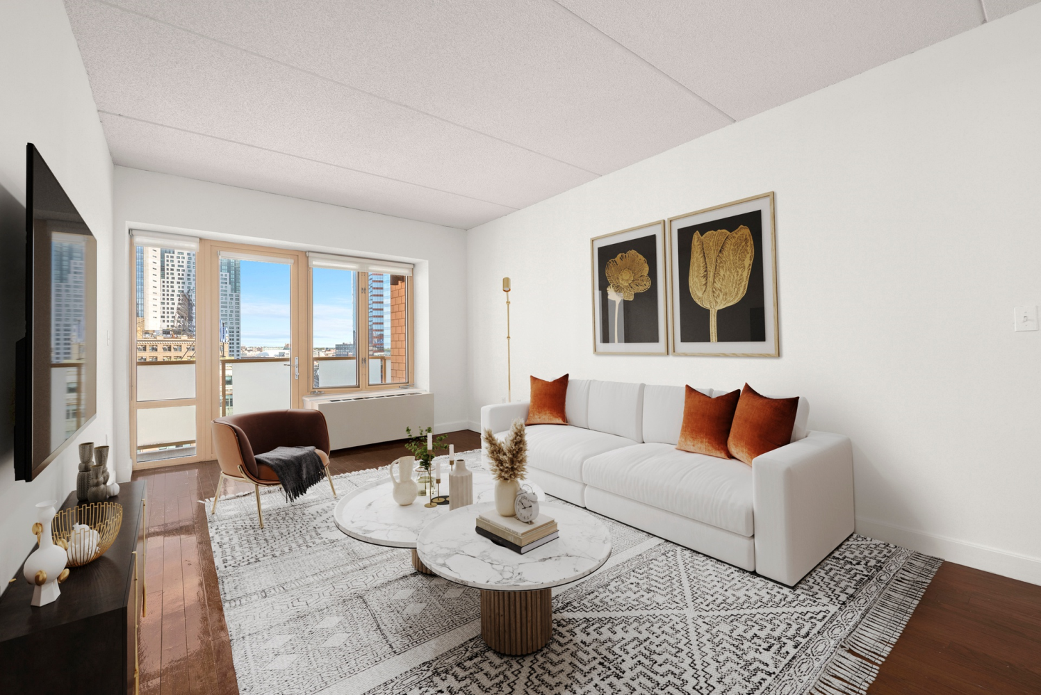 a living room with furniture and a flat screen tv