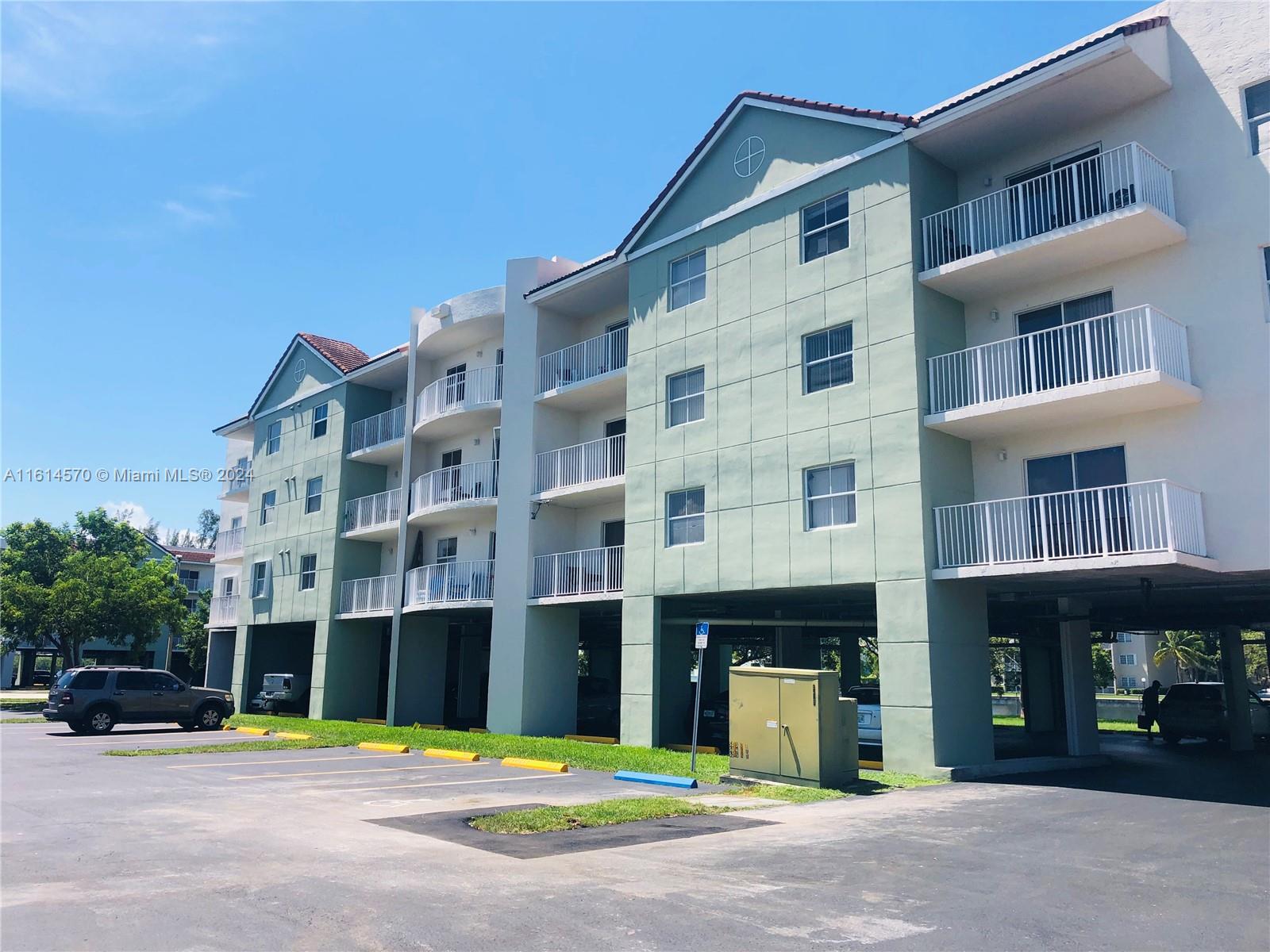 a view of a building with a street