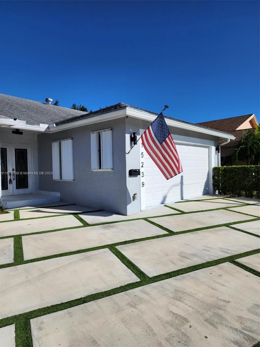 a view of the house with a street