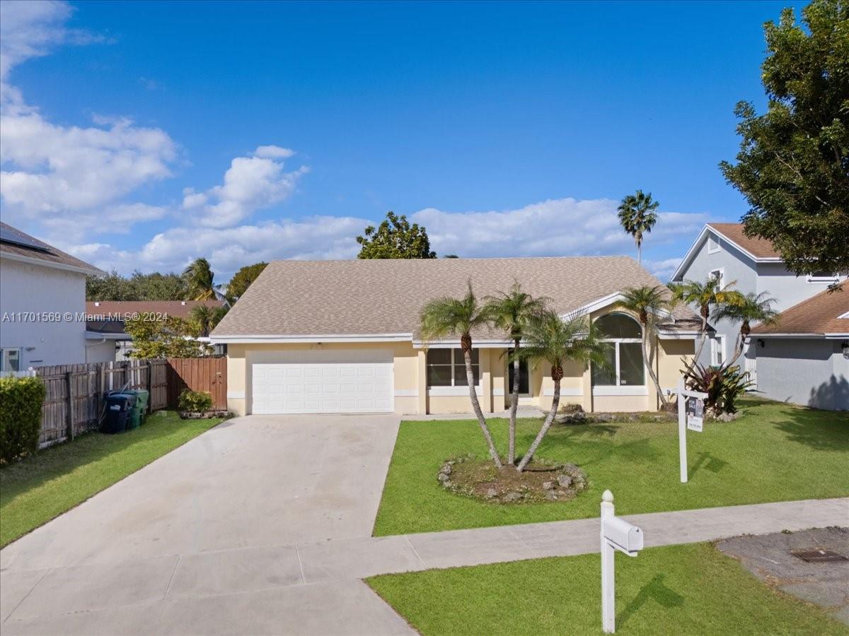 front view of house with a yard