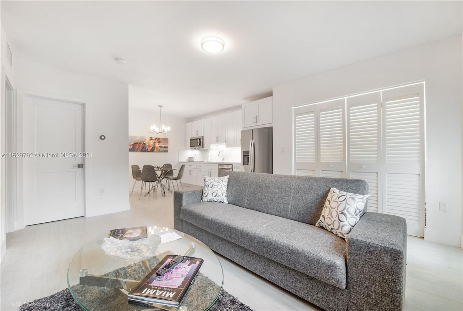 a living room with furniture and a couch