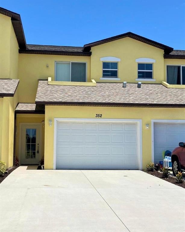 a view of front door of house with outdoor space