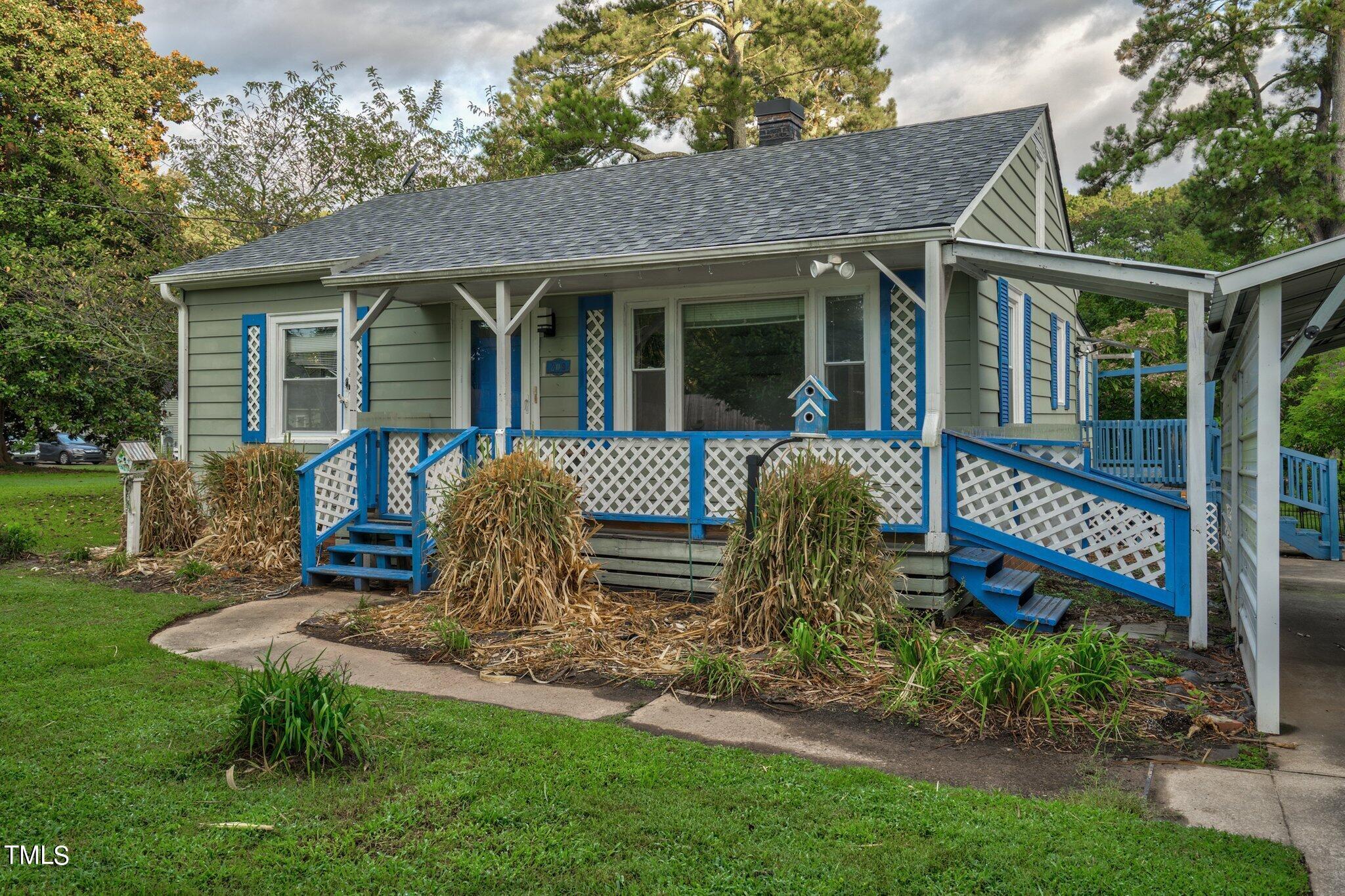 front view of a house with a yard