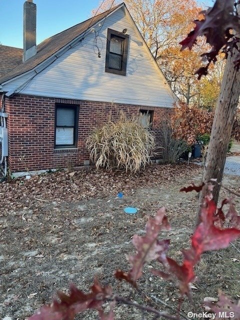 a brick house with a yard