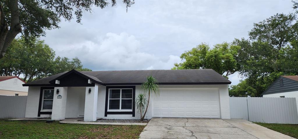 a front view of house with yard