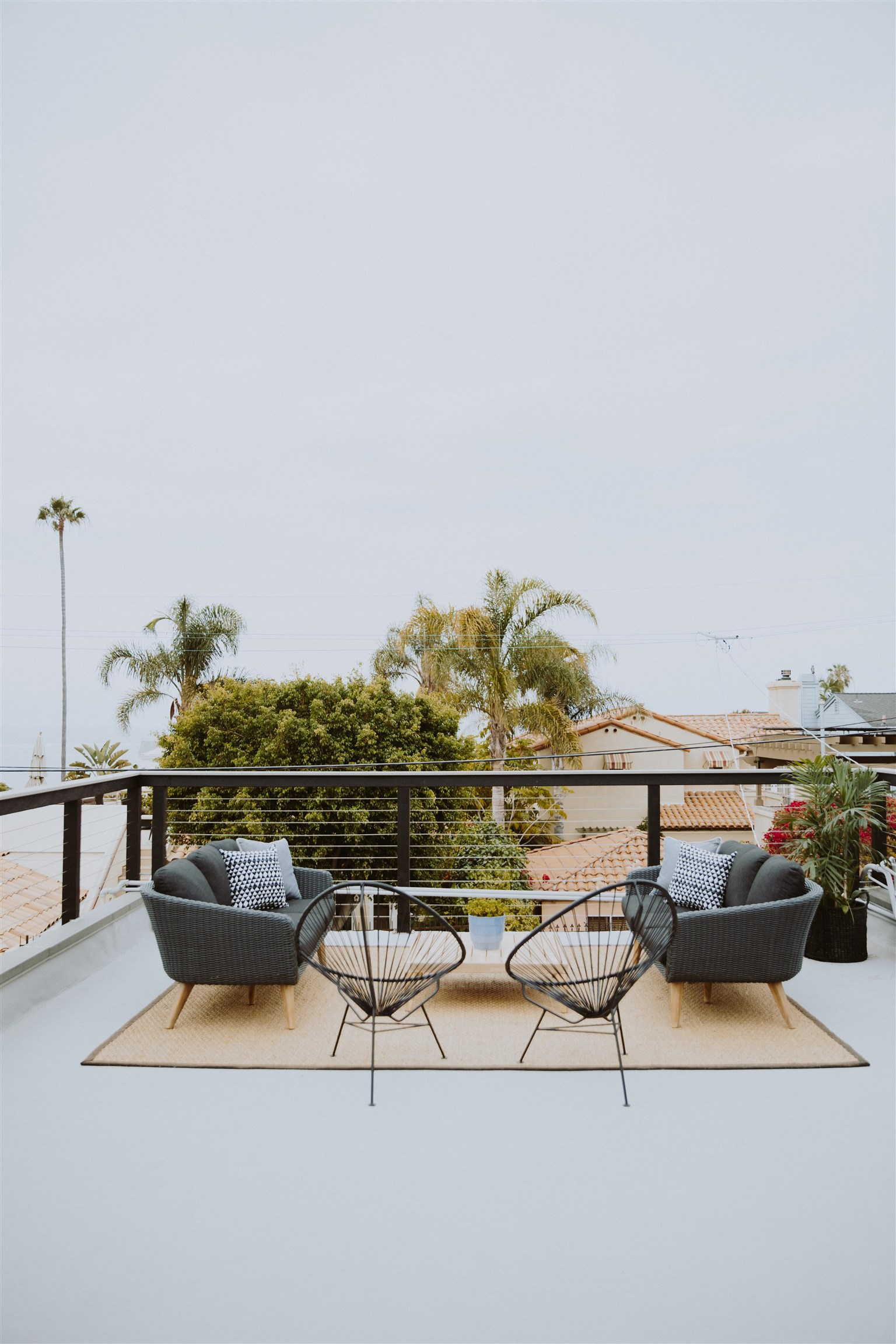 a view of swimming pool with outdoor seating and city view