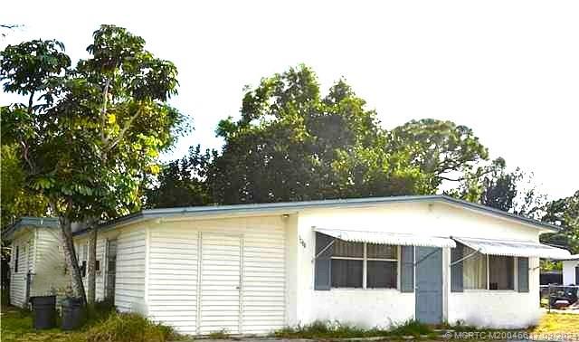 a view of front a house with a garage