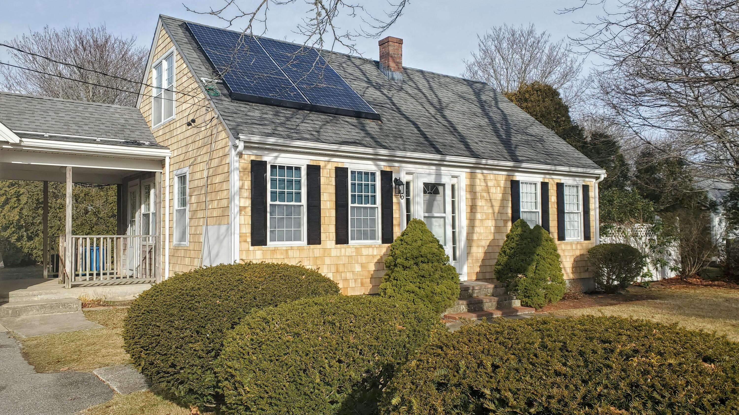 a view of a house with a garden