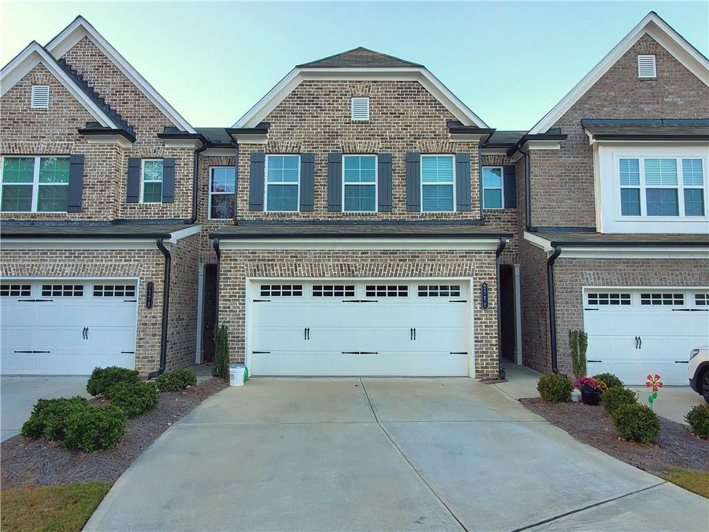 front view of a house with a garage