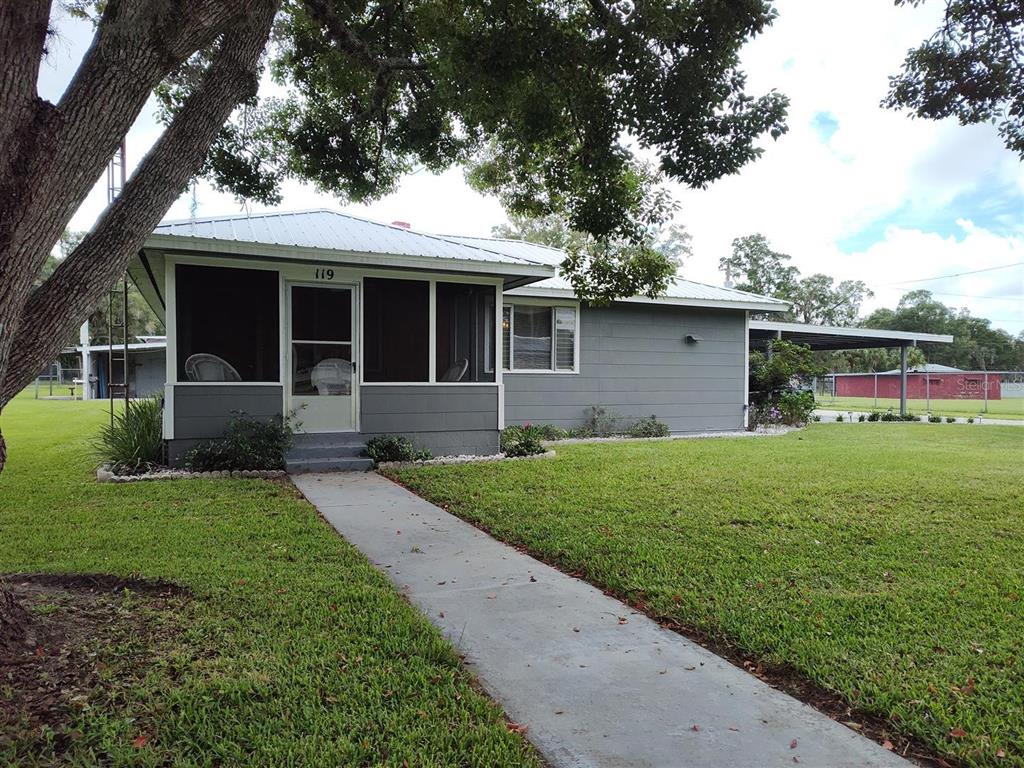 a front view of house with yard