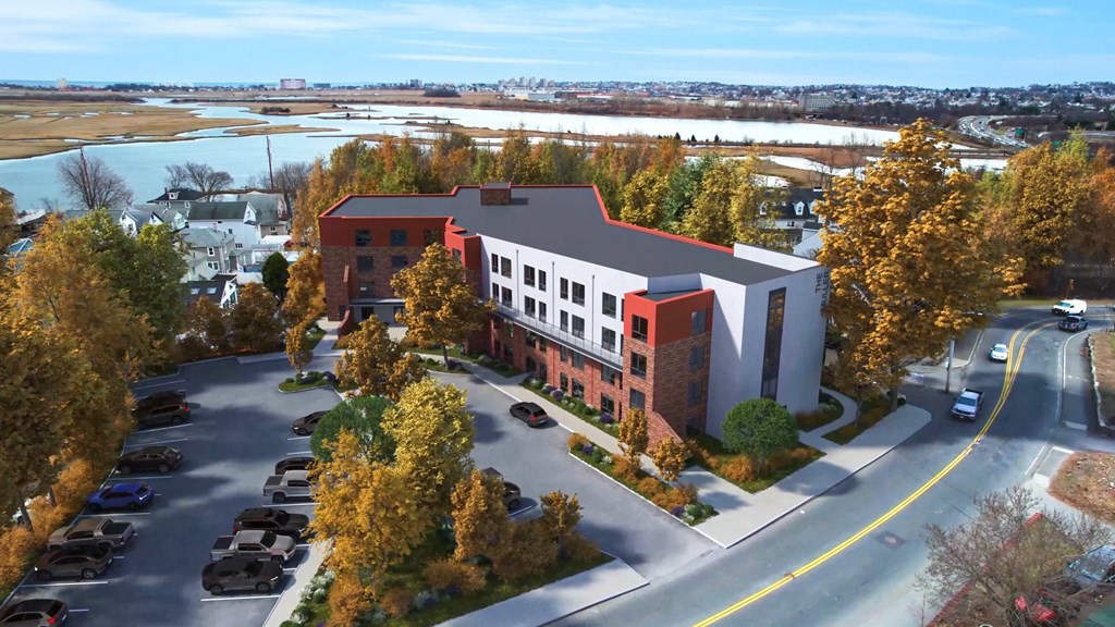 a view of a lake with a building in the background