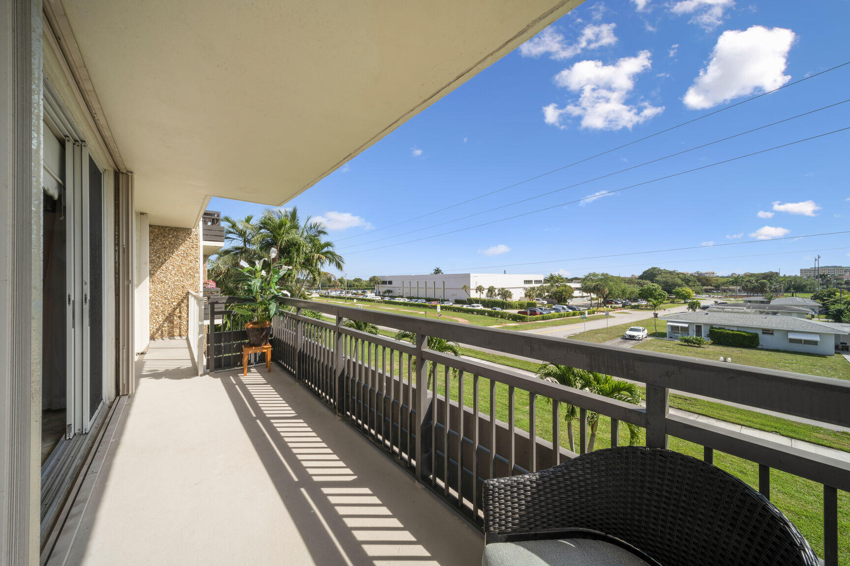 a view of balcony with furniture