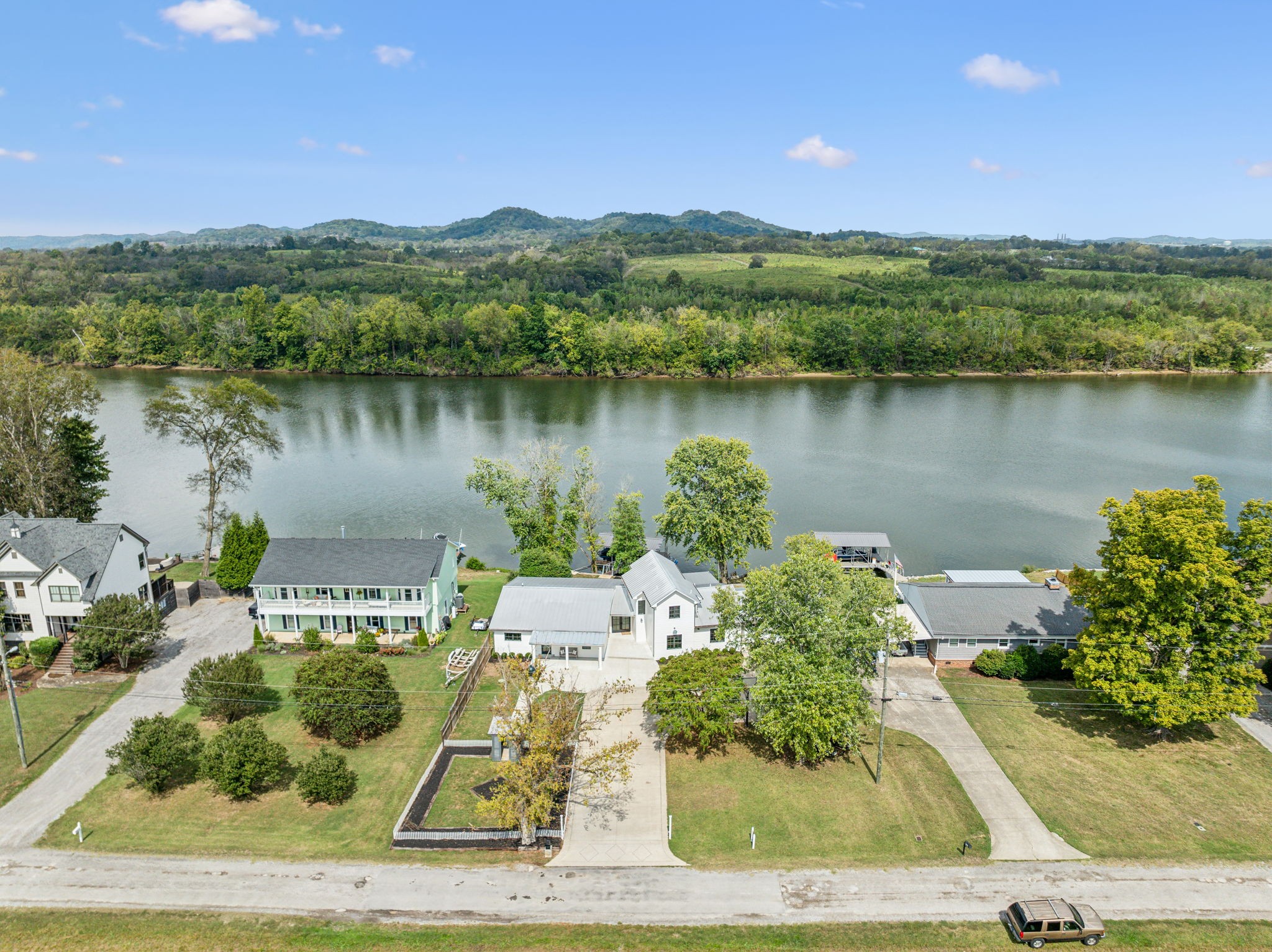 Rare opportunity...Only a handful of homes on this private drive, with river front access.