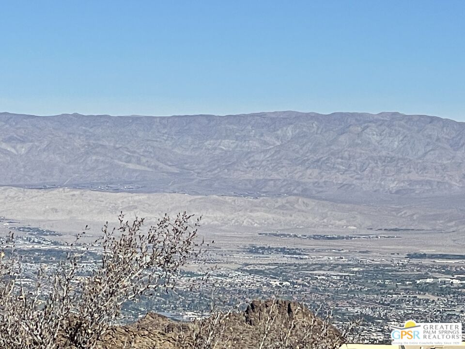 a view of ocean and mountains