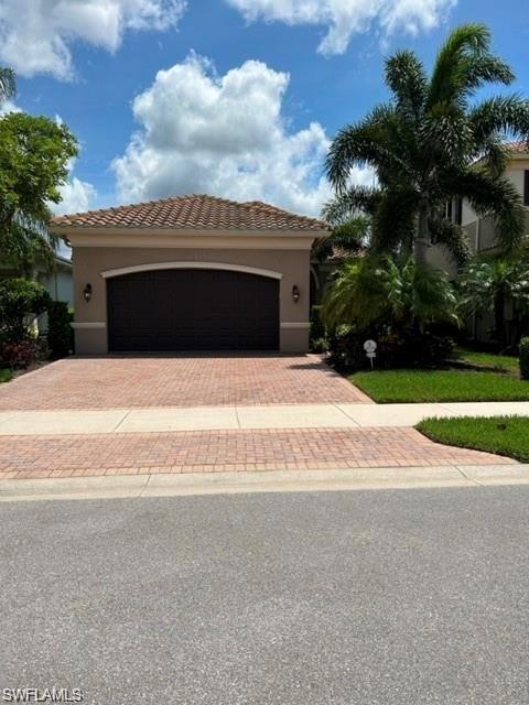 a house with yard in front of it