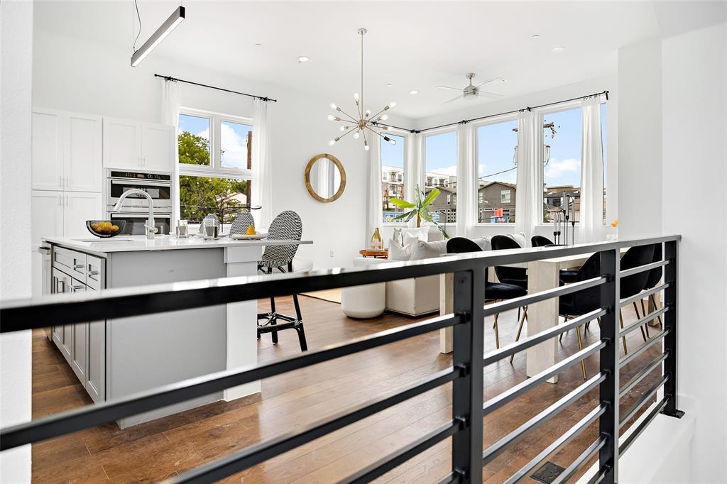 a kitchen with a sink cabinets and window