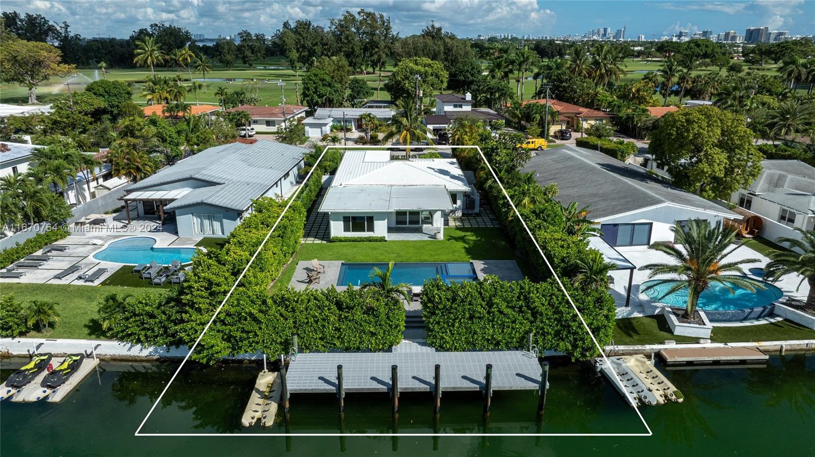 an aerial view of a house with a garden