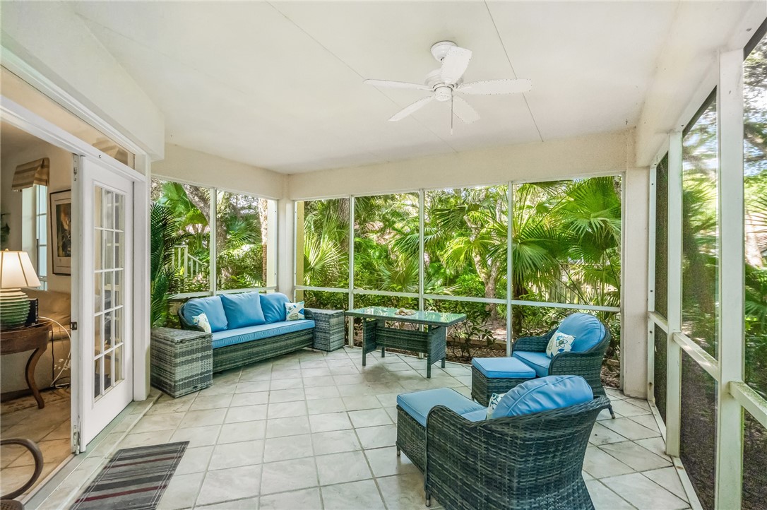 a outdoor living space with patio furniture and garden view