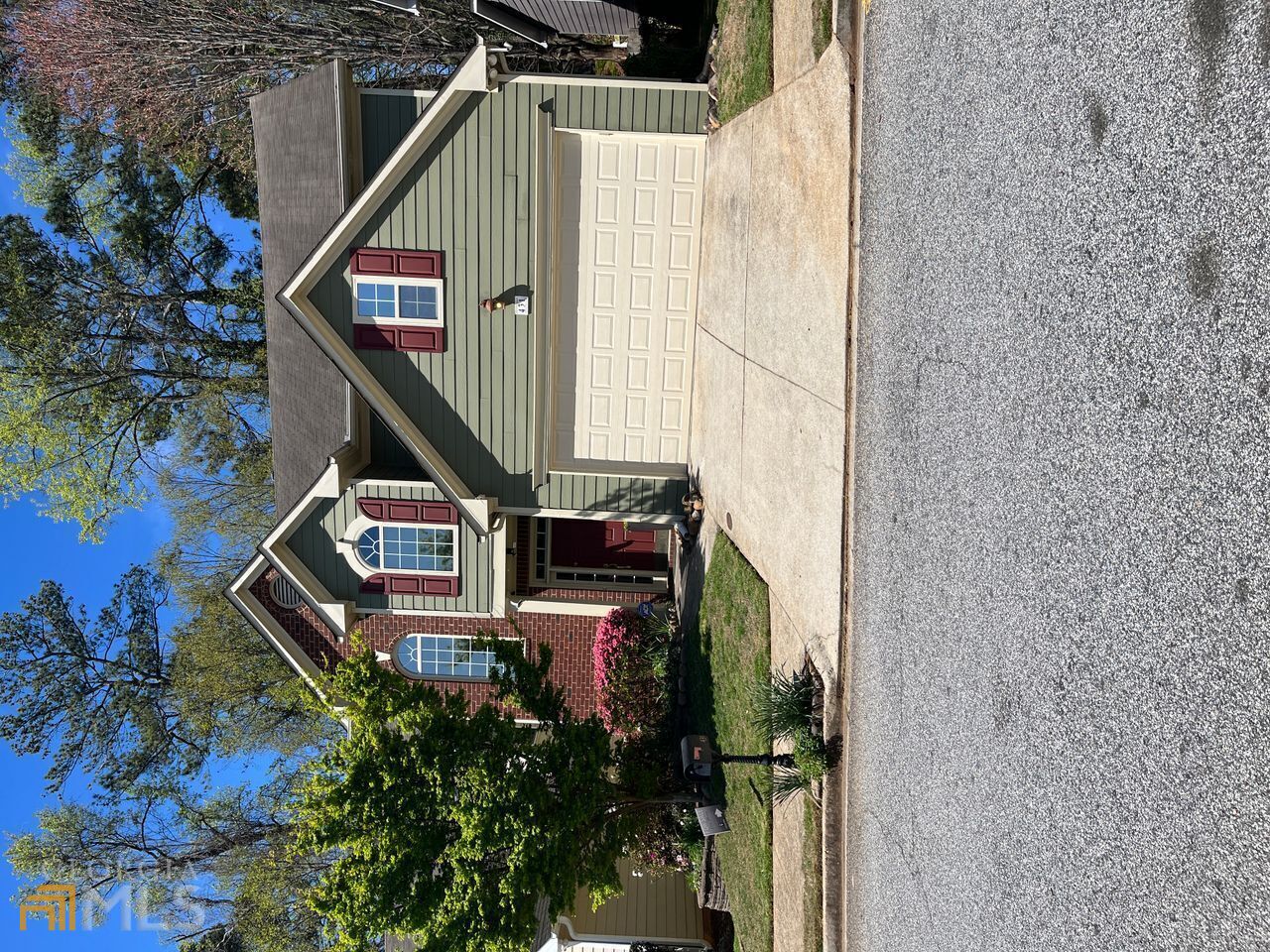 a house with trees in front of it