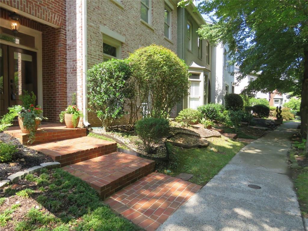 a view of a yard in front of a house