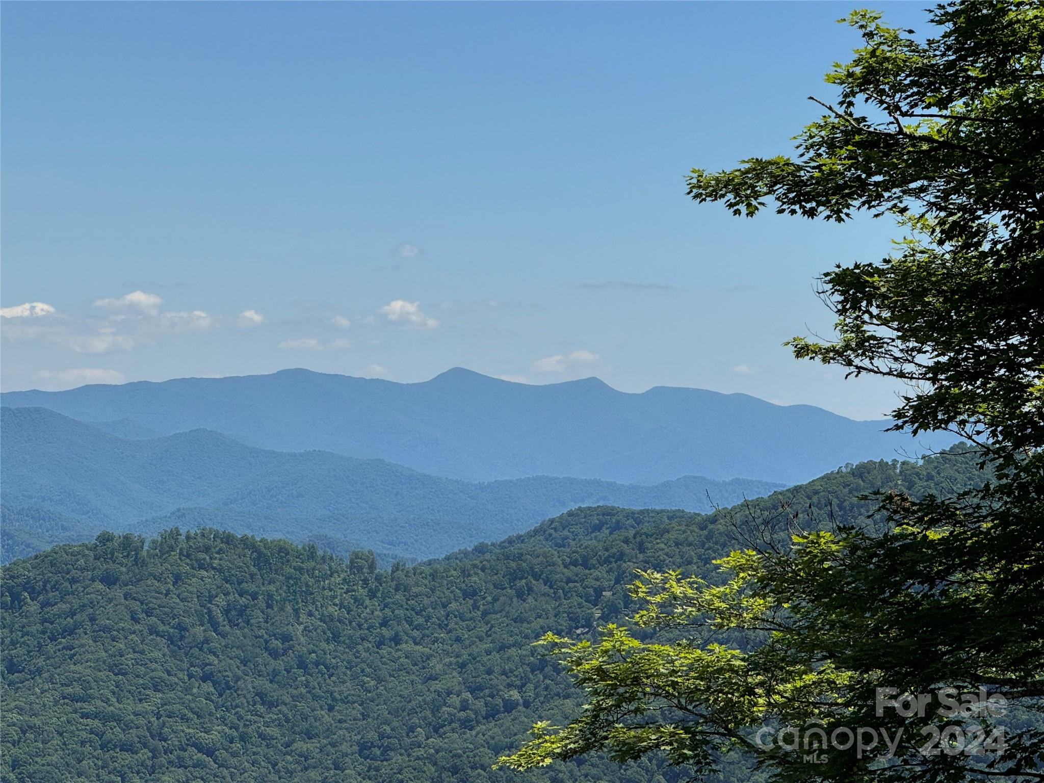 a view of an outdoor space and mountain view